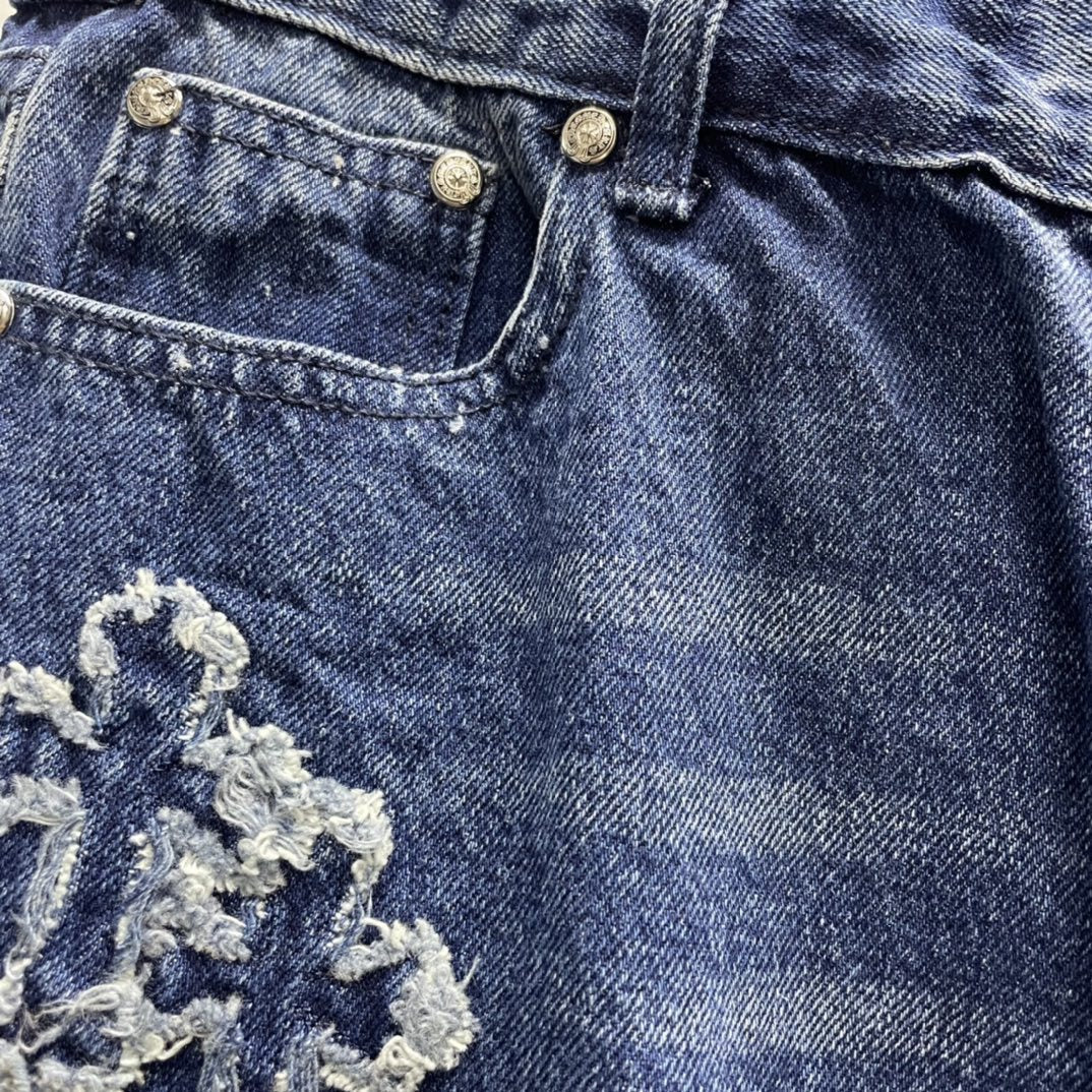 Blue Jeans with Distressed Detailing