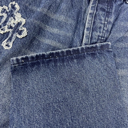 Blue Jeans with Distressed Detailing